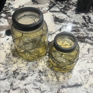 Set of Two Yellow Glass Jars with Wire Design